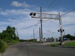 The Railroad Crossing (Whitman Ave.,)  Which Is Near The Yard