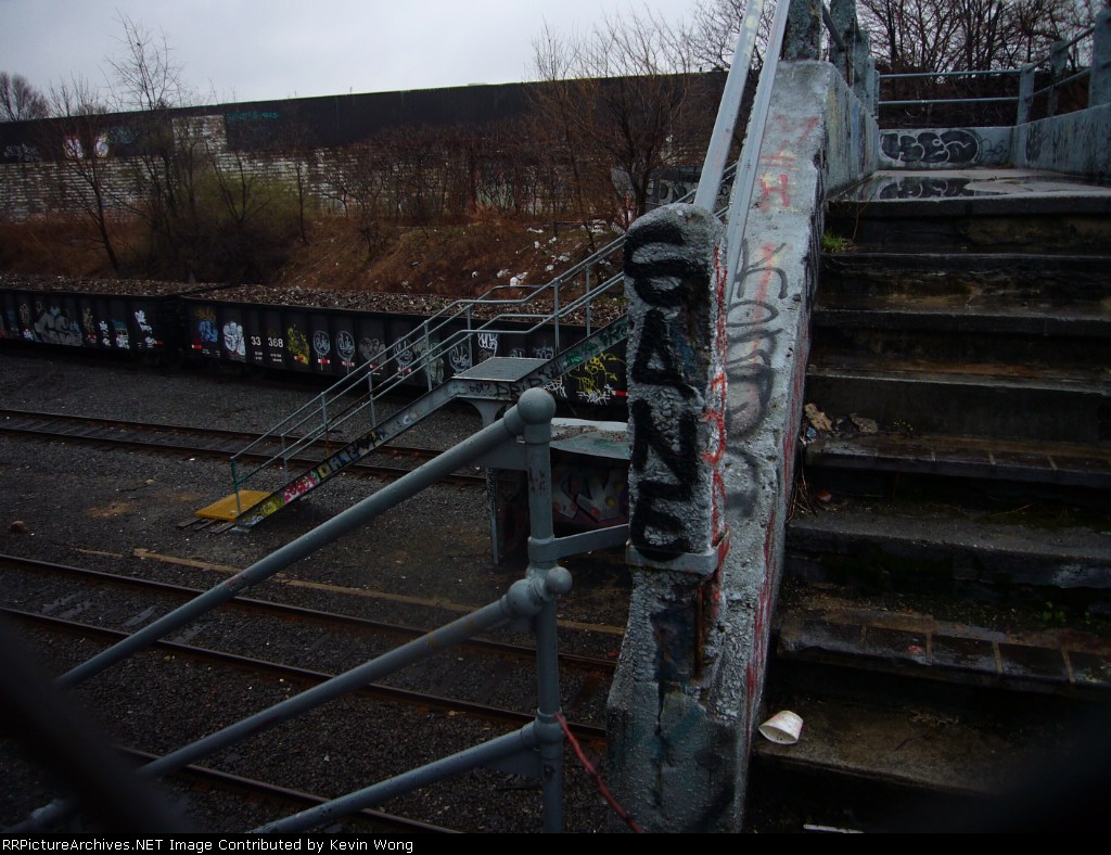 Fresh Pond station, view down to tracks from foot bridge