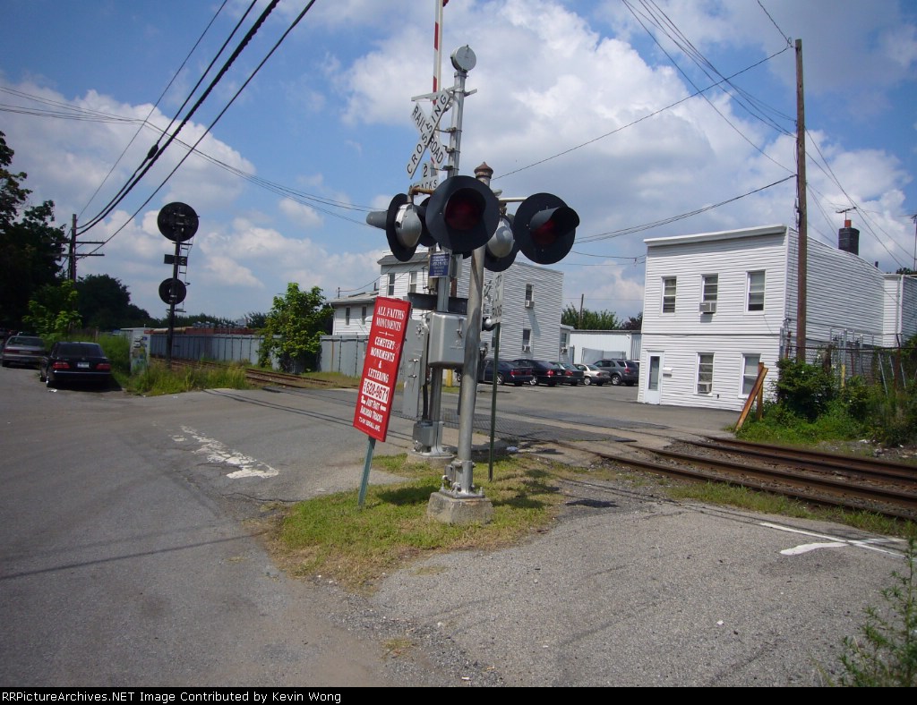 The small paved area near the tracks served as a makeshift "platform"