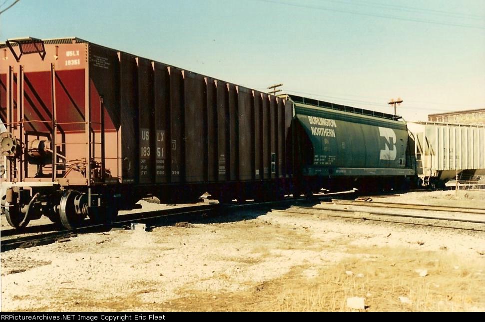 BN freight cars derailed at the IC & Broadway crossing.
