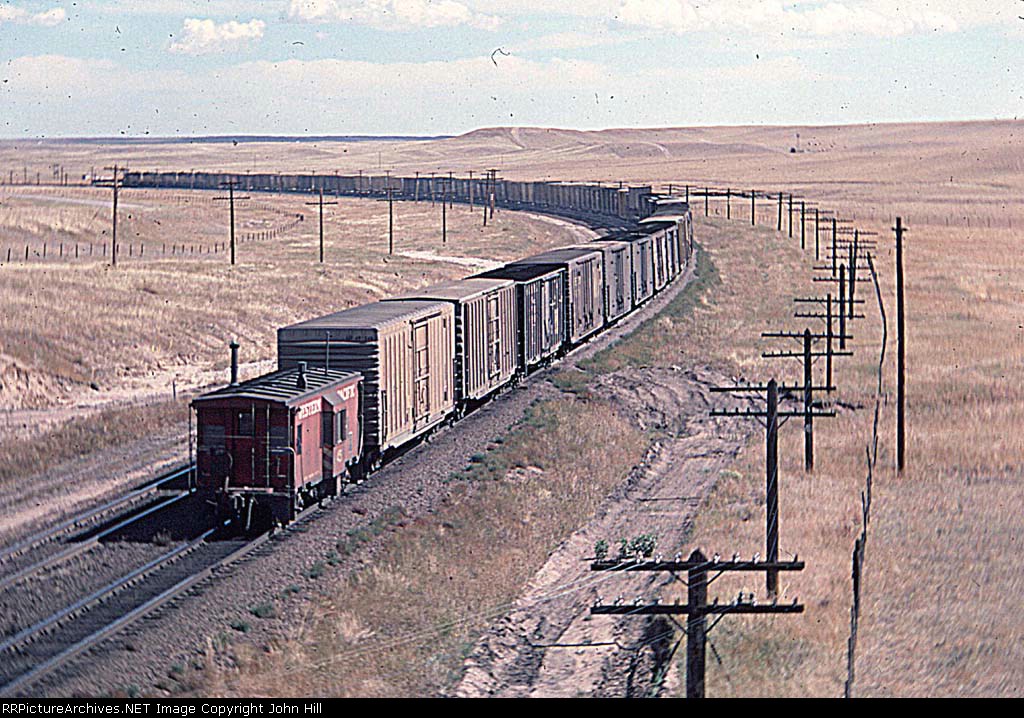 1098-31 Eastbound UP freight with WP caboose