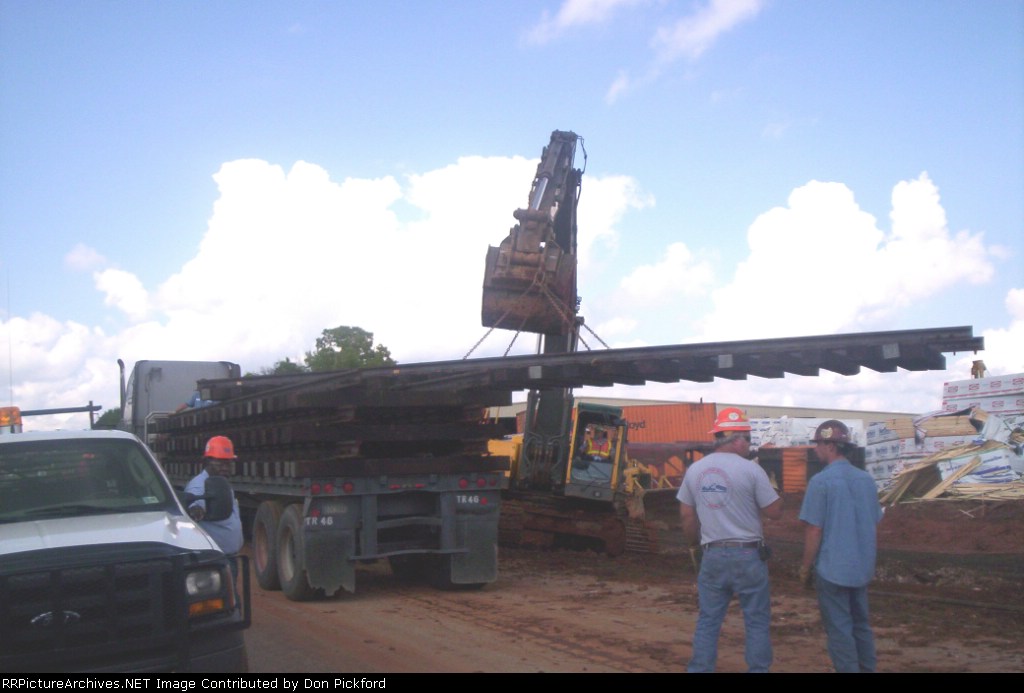 CSX Derailment. These guys DO NOT mess around, temp rail is unloaded for placement during cleanup
