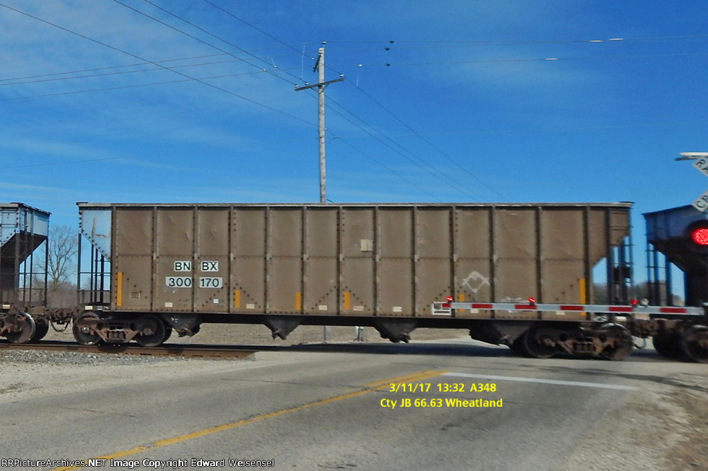 A348 heads across Hwy JB