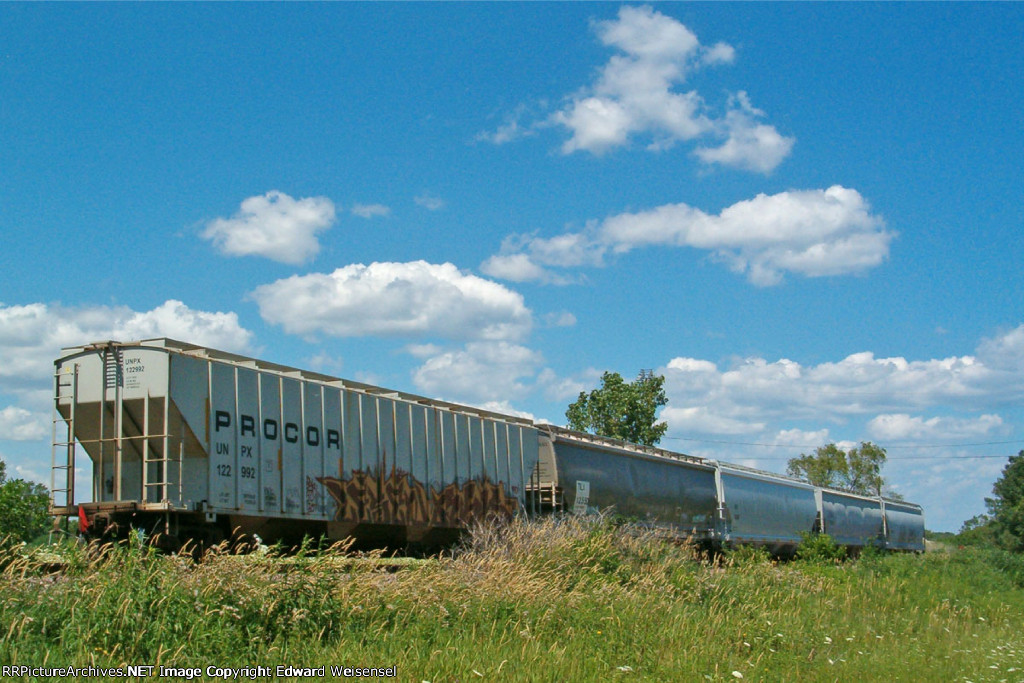 Red-flagged mercilessly tagged UNPX 122992 brings up the rear of Bain local job 41