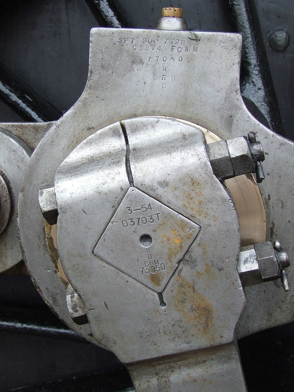 The eccentric crank of 73050, showing the build date, 3-54, and the loo number 73050.