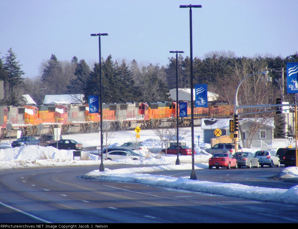 A hell of a SD75M lashup behind a pair of Dash9's