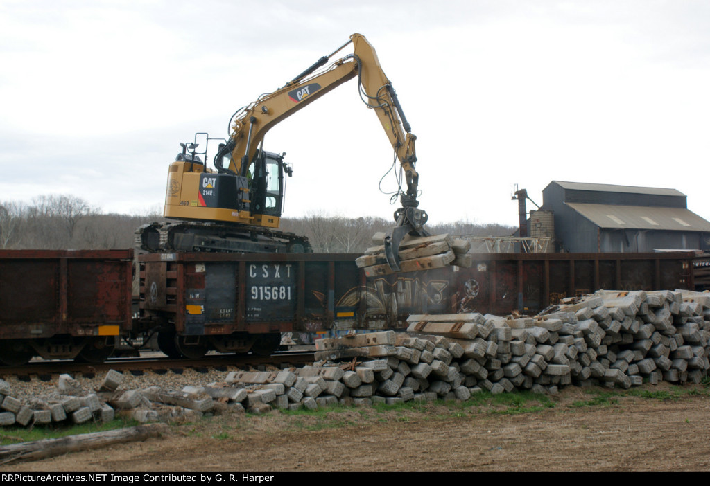 Claw riding in gondola grabs about two tons worth of concrete