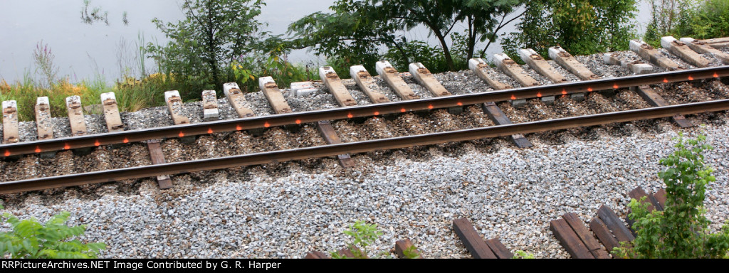 The state of the railroad after the concrete tie yanker-outer finished his business
