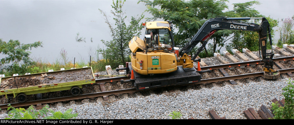 After the concrete tie yanker-outer went by, electromagnet scarfed up Pandrol clips left behind