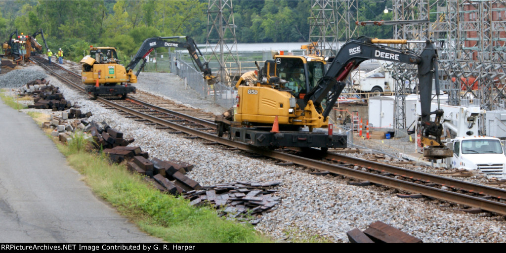 Street level view of electromagnets at work collecting Pandrol clips