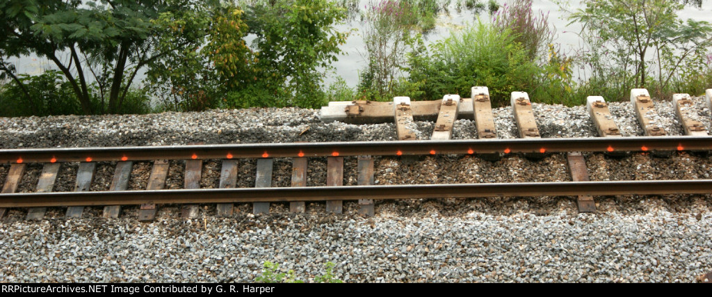 In place, but unspiked wood ties at MP cab 150.9 on the James River S-D