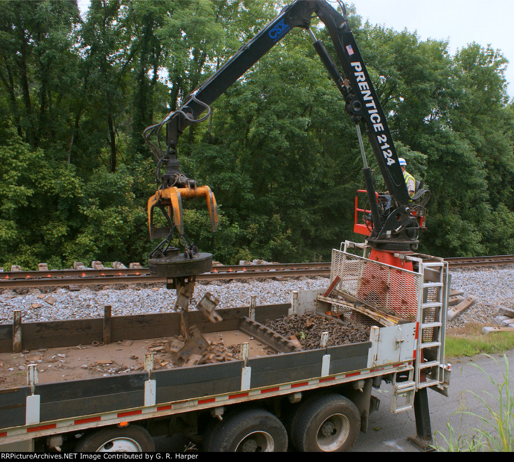 Yet another electromagnet in action this time collecting scrap piled up on the right-of-way