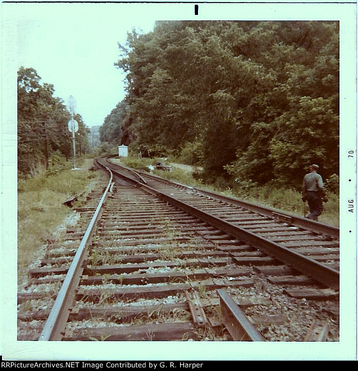 East end Reusens siding straight-railed.  New frog needed. Old one tossed to the left.   One "bent" of the Southern trestle over the James River visible in background.