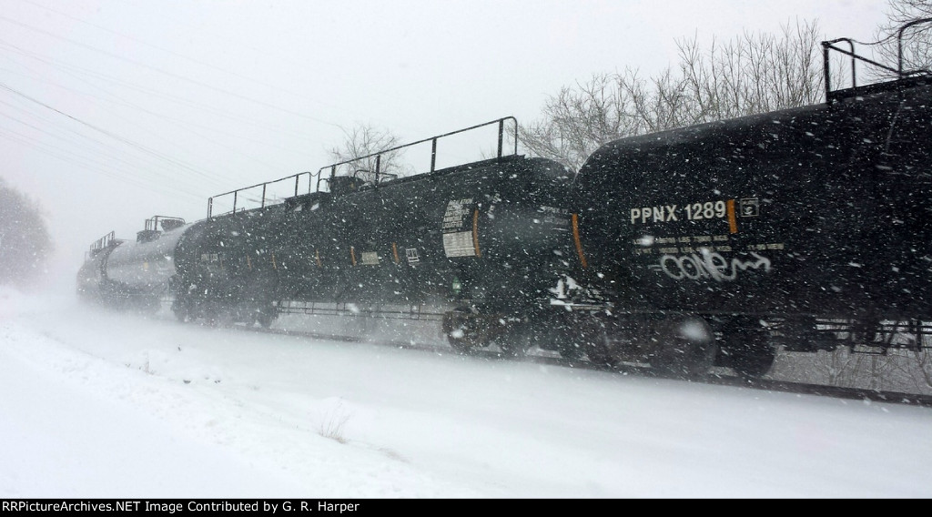 PPNX 1289 in the consist of ammonia train W94313 in driving snow