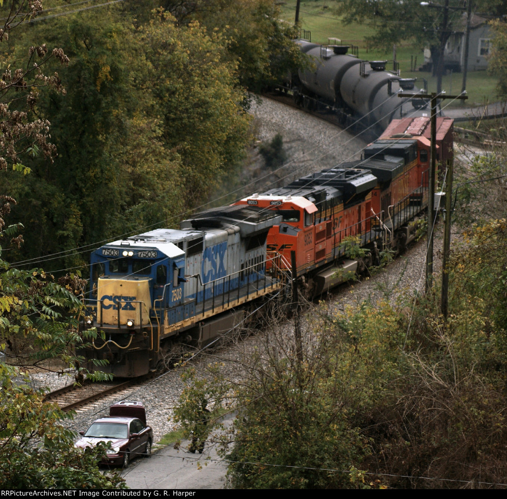 Unusual to have home road power on these trains, but CSXT 7503 leads oil mtys K08114 in the curve at V.E.S. Rd. and Hydro St.
