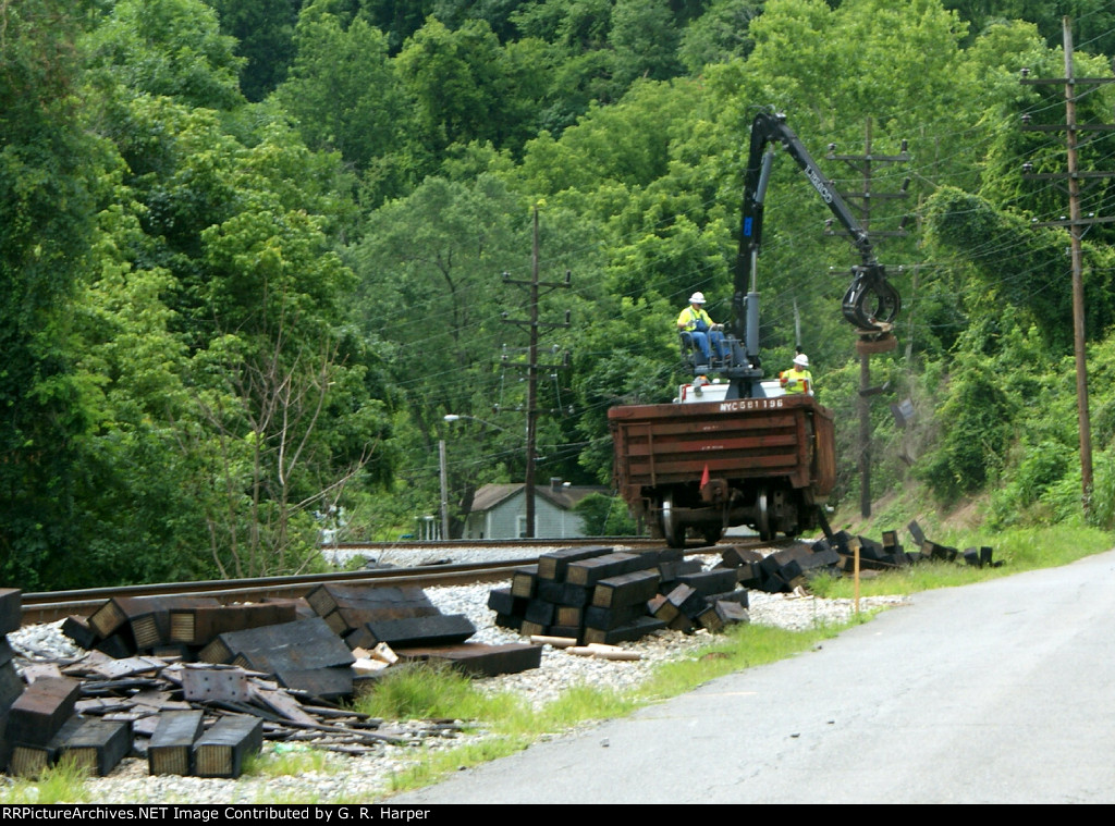 M of W unloads ties plates in preparation for wood tie installation