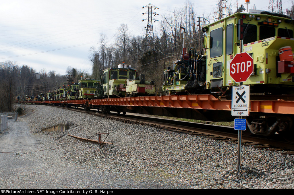 M of W equipment on the move westbound.  W03704