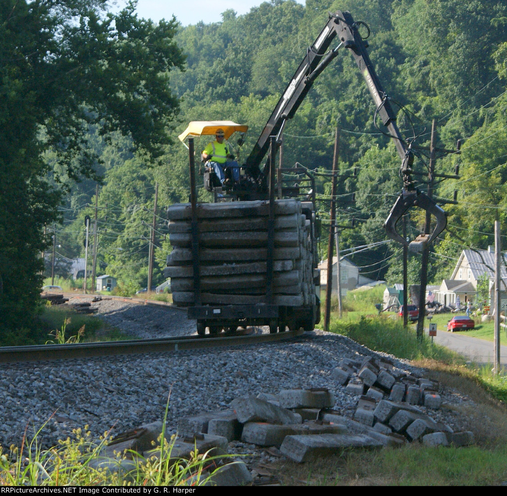 Clean-up began early the next morning.  Here the discarded concrete ties are being collected for further disposition