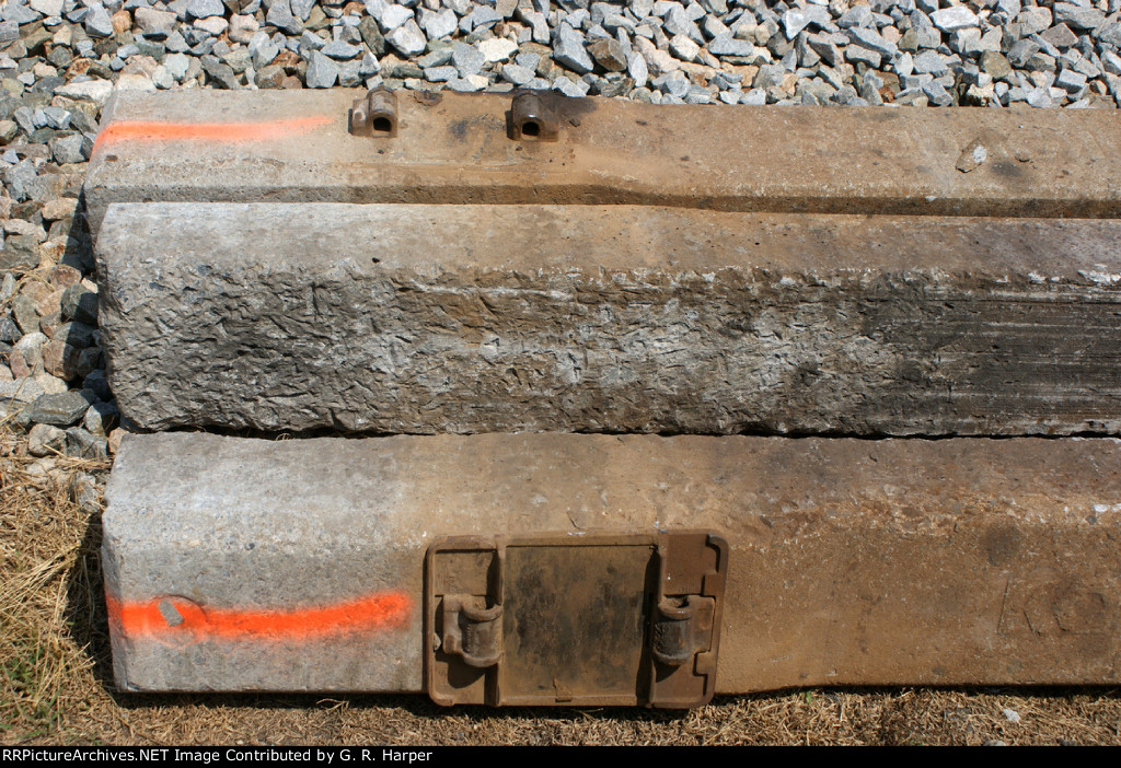 The top and bottom of concrete ties after 24 years of service on a heavy-tonnage route