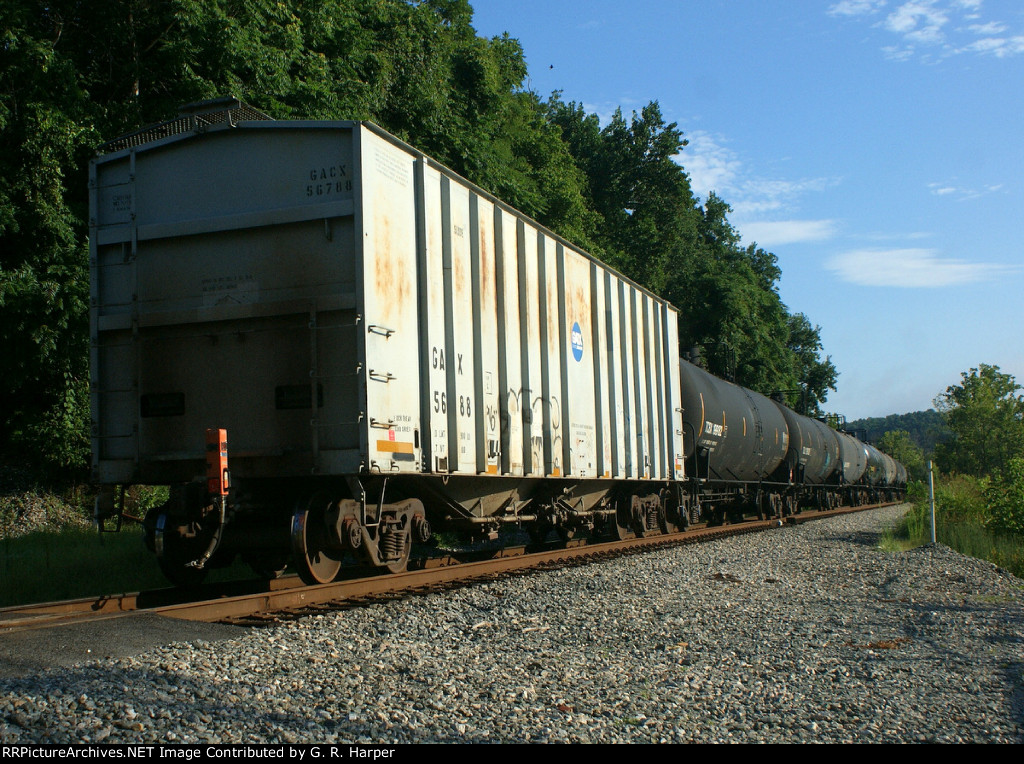 Rear buffer car on K42424, which I am assuming is an empty ethanol train
