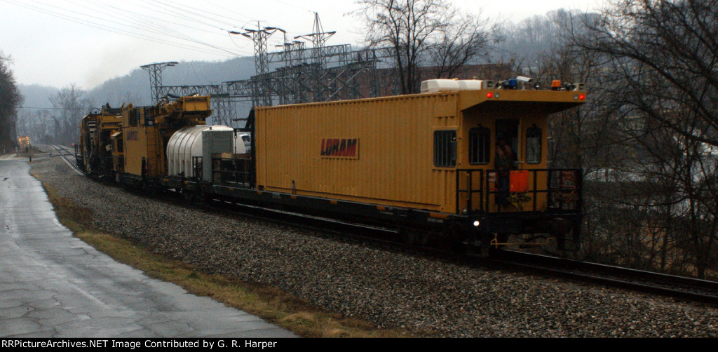 Going away shot of the W05010, a Loram undercutter "train"