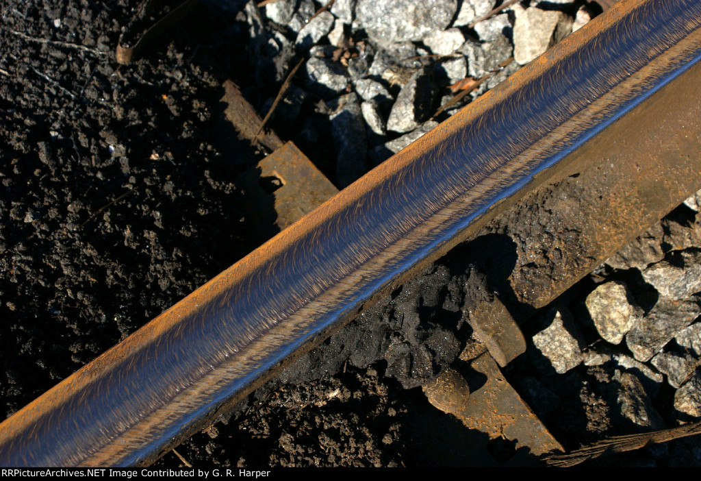 Rail head after rail grinder did its thing two days ago.  It makes the passing trains HUMMMM