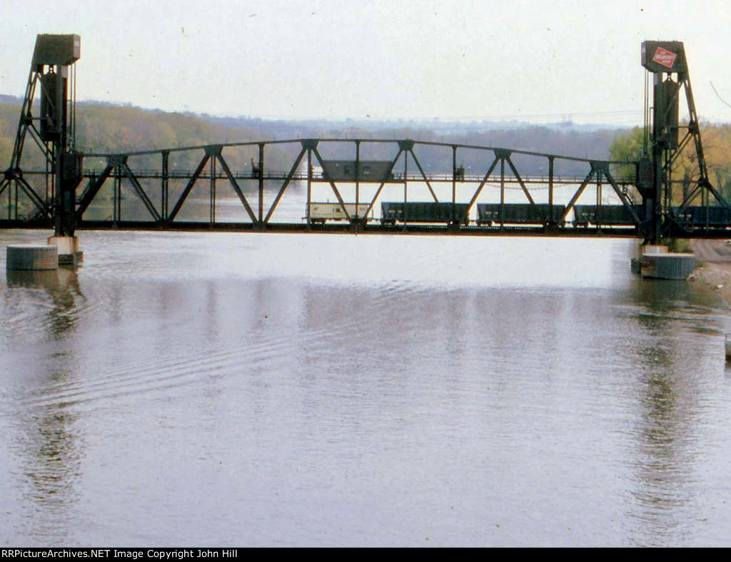 1382-03 Eastbound CNW coal train crosses Mississippi River on MILW Lift Bridge
