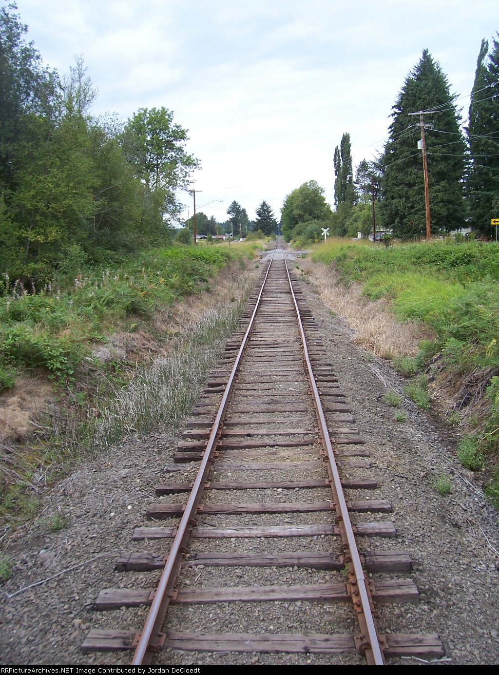 Crossed Railroad Ave