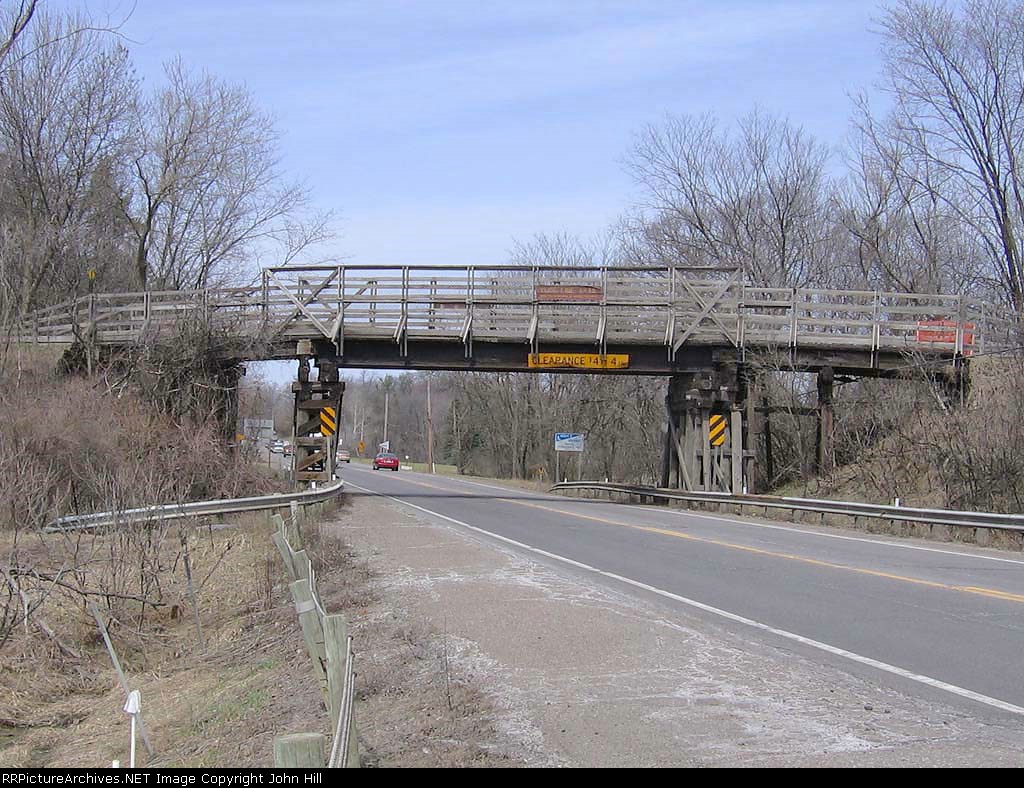 070416008 Low clearance ex-Minnesota Western bridge over Hwy 12, currently part of Luce Line Trail. Soon to be replaced by nearby MW truss bridge over BNSF Wayzata Sub.