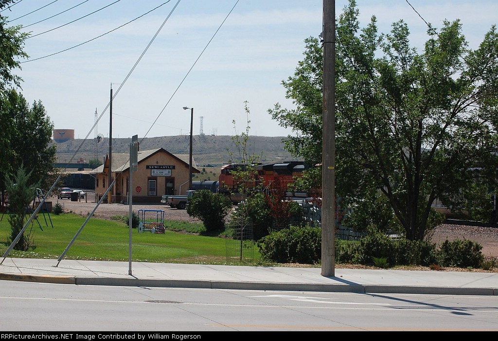 A Northbound Burlington Northern Santa Fe Railway Freight Train passes the MoW Facility