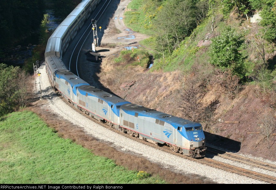 Amtrak's Capitol limited, PO 30, rounds the bend in the morning sunlight