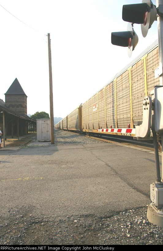 Autoracks passing the station