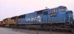 NS 6777 leads a UP unit southbound at Pomona Yard
