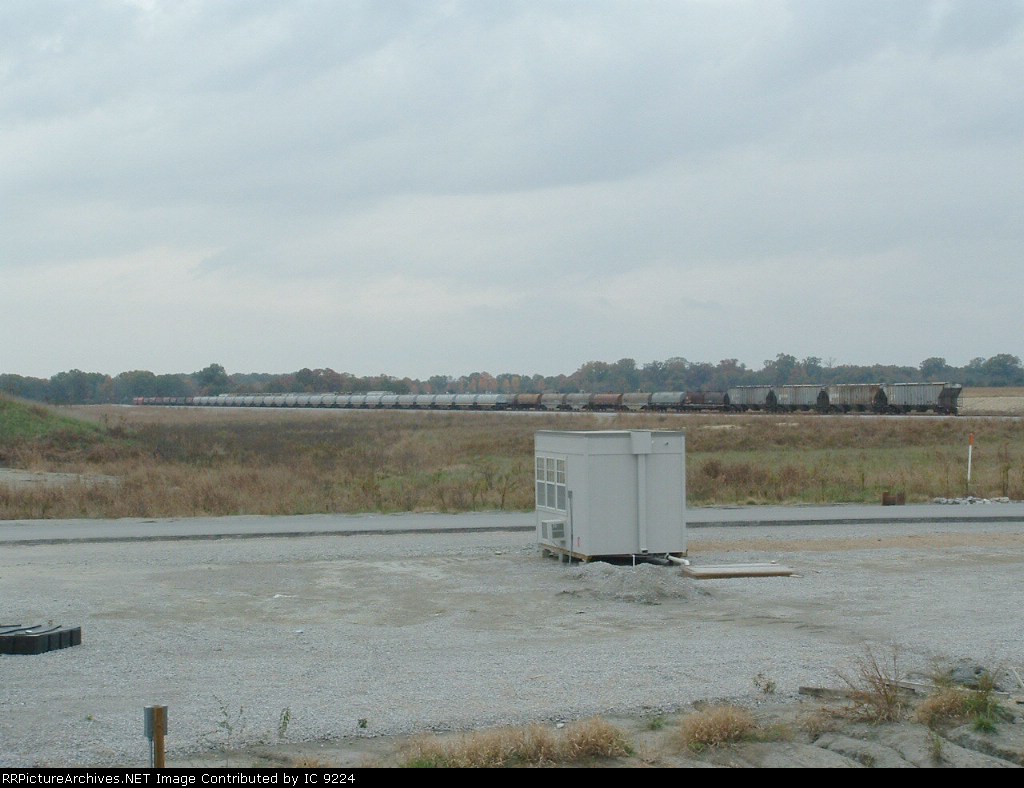 Covered coil gons and ash cars in the west yard