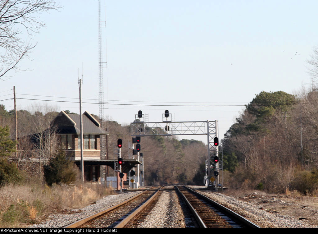 Signals on CSX "A" line facing northbound with crossing of NS