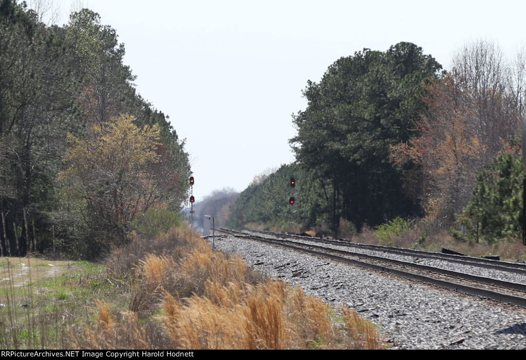 Approach signals @ "Firestone" lit because Q410 is occupying the block