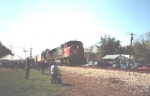 A North bound CN train pass through Ridgeland as a crowd awaits for the IC passenger train