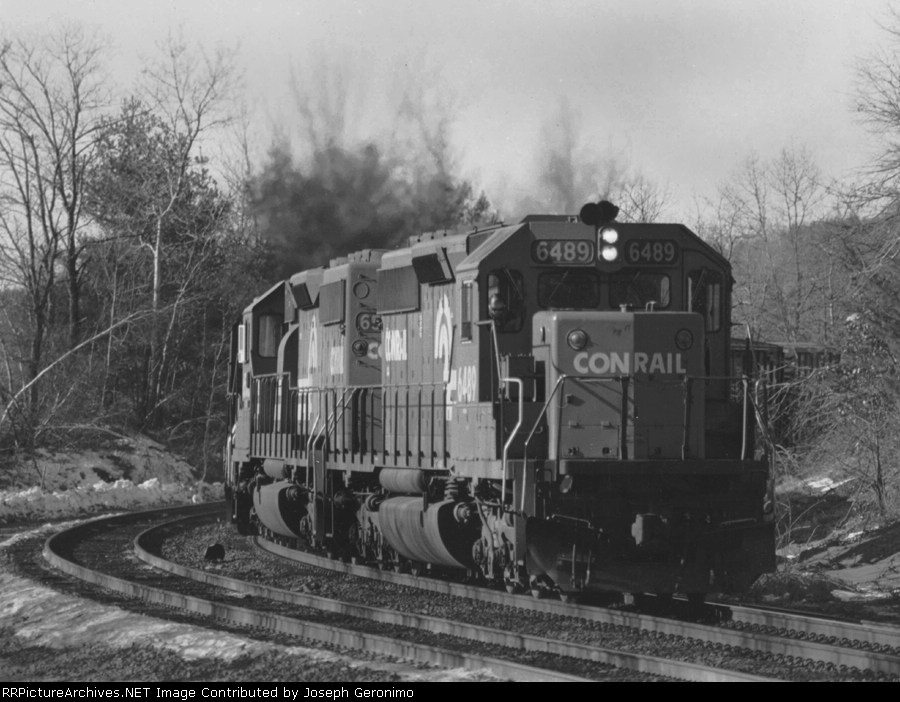 Conrail E/B freight slugs it out with the Berkshires 1/1993.