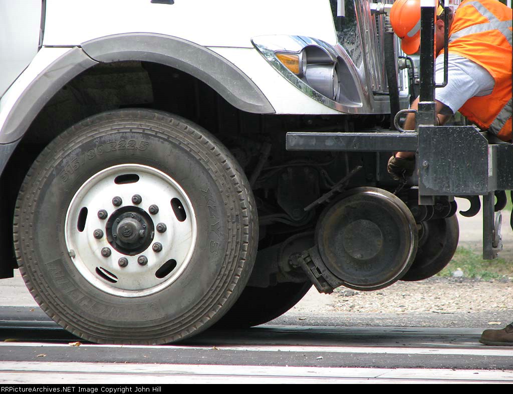 080624022 BNSF high-rail truck sets itself off on Nicollet Island on Auxiliary track on Wayzata Sub