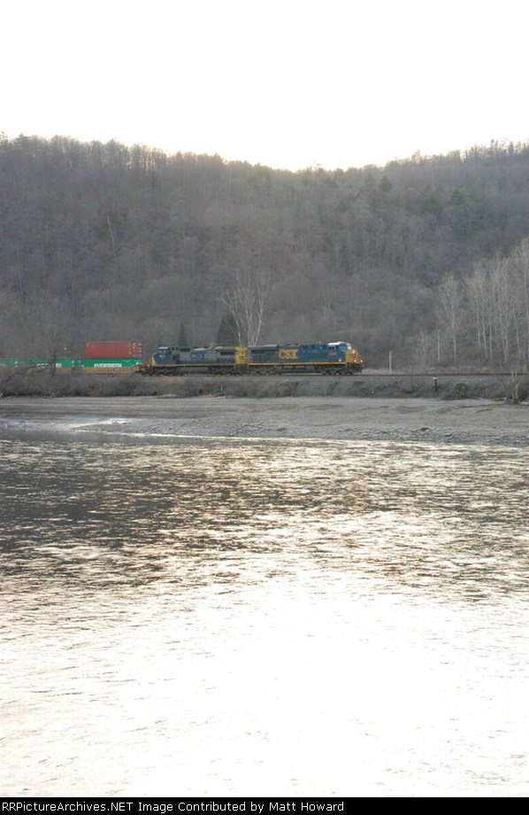 An eastbound stack train heads east at Lock 13.