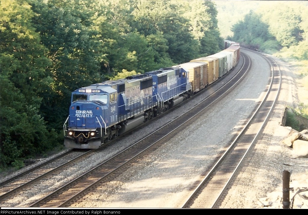 SD60I 5641 descends the grade westbound on track 1 in the late afternoon