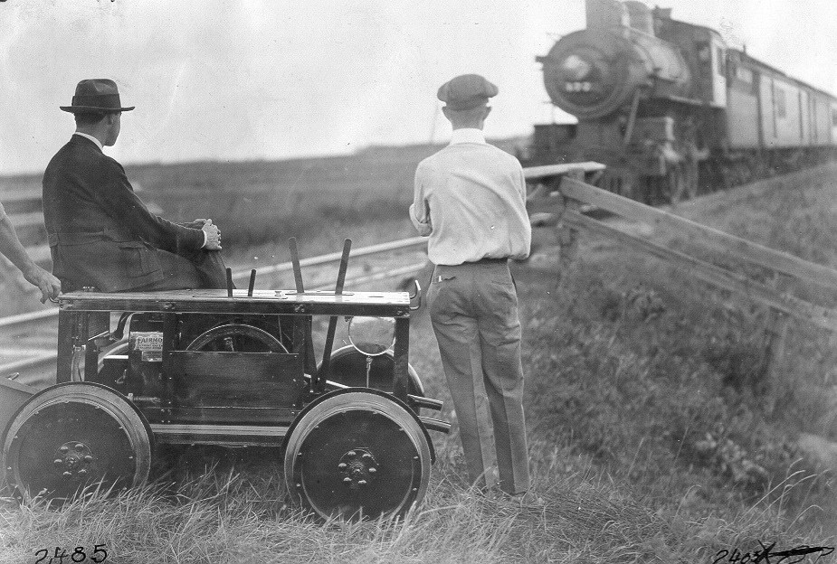 Motor car meeting train