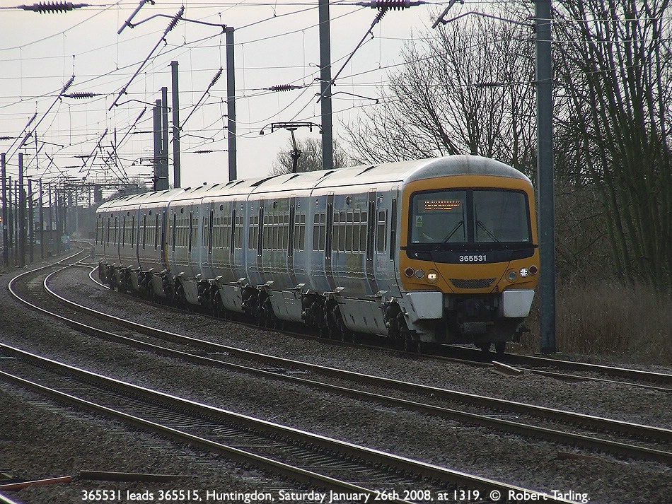365531 leads 365515 on a Down Peterborough stopper.
