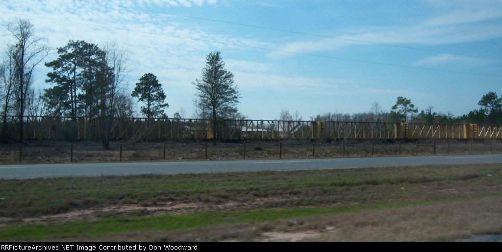 East of Pearson there are several mnles of cars stored on an old line along Highway 82