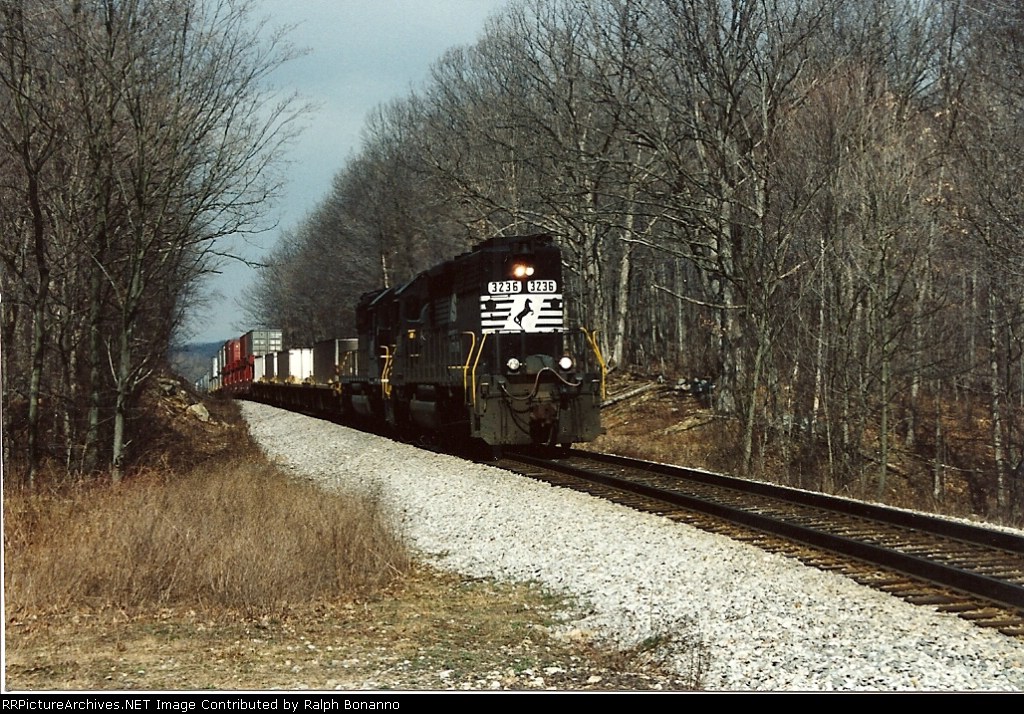 SD40-2 3236 plus 1 lead train 258 over the crest of the grade eastbound to Little Ferry