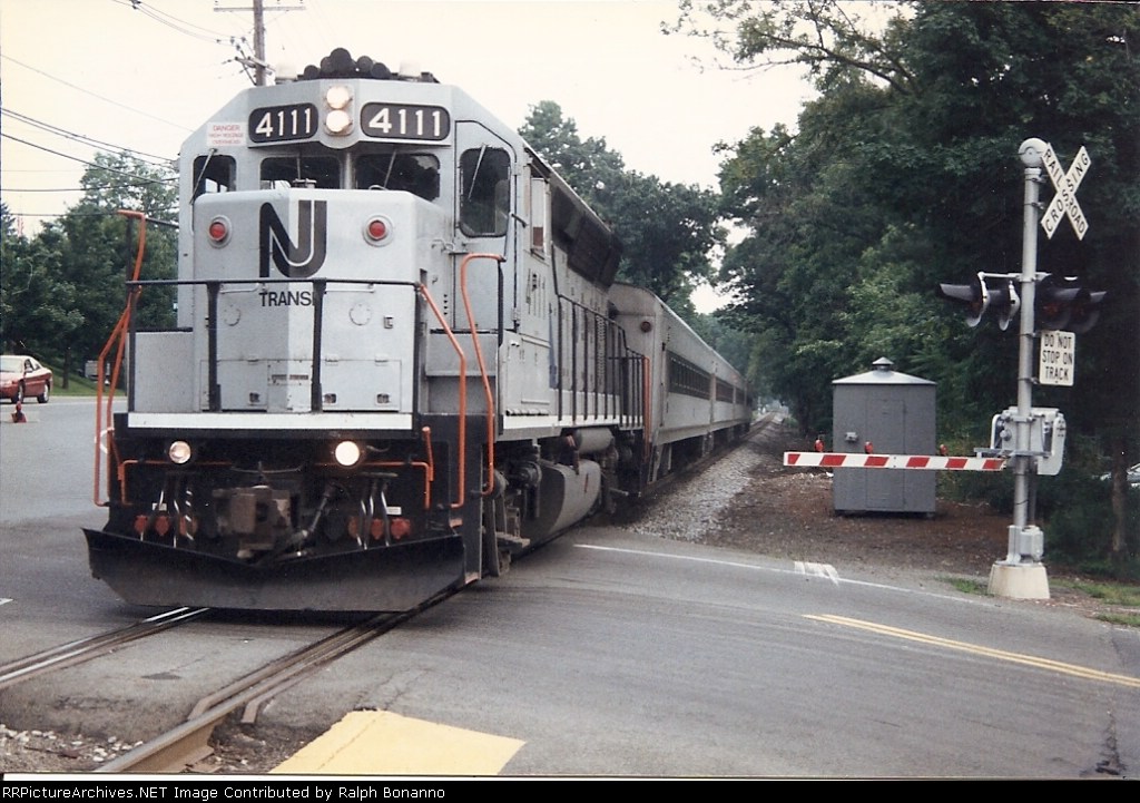 A typical Pascak Valley Line trian rolls into the station one summer evening