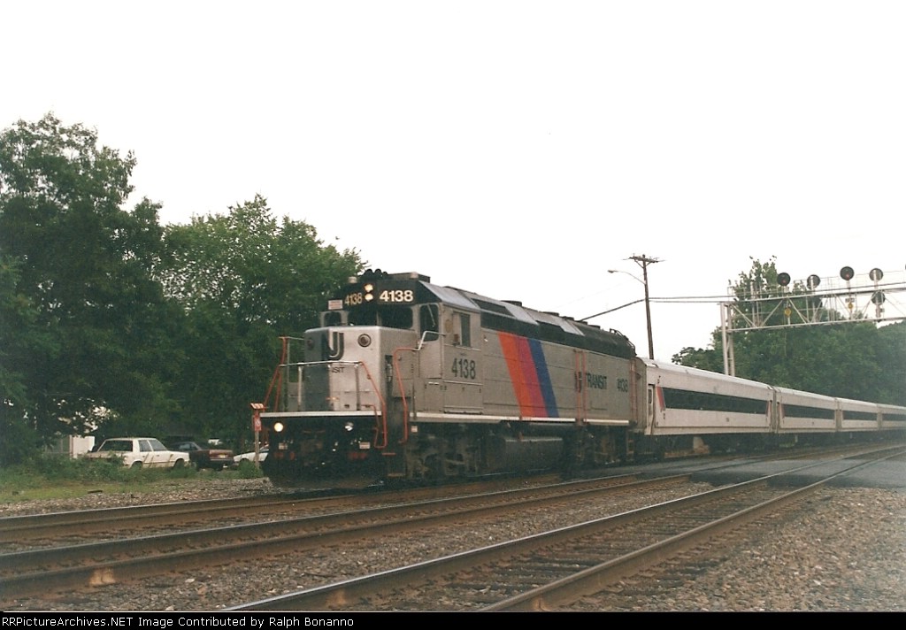 Warthog 4138 accelerates from the station, and heads upgrade for Waldwick and points west