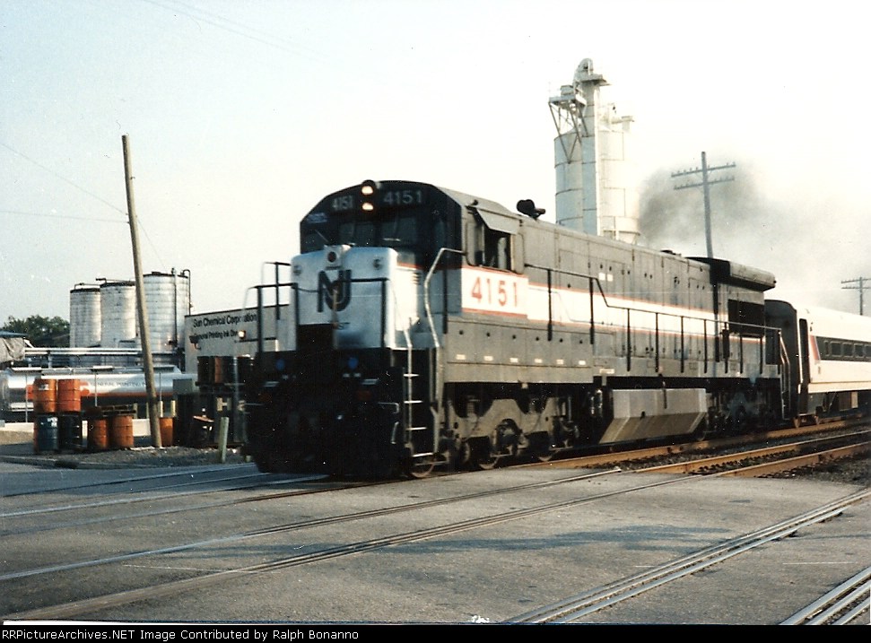U34CH 4151 accelerates a westbound  having just left Rutherford station