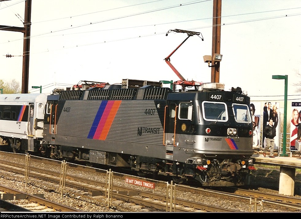 ALP44 4407  departs  for New York in push mode