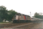 Warthog 4138 accelerates from the station, and heads upgrade for Waldwick and points west